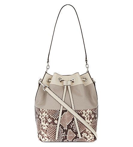 michael michael kors dottie large studded bucket bag|Michael Kors bucket bag outlet.